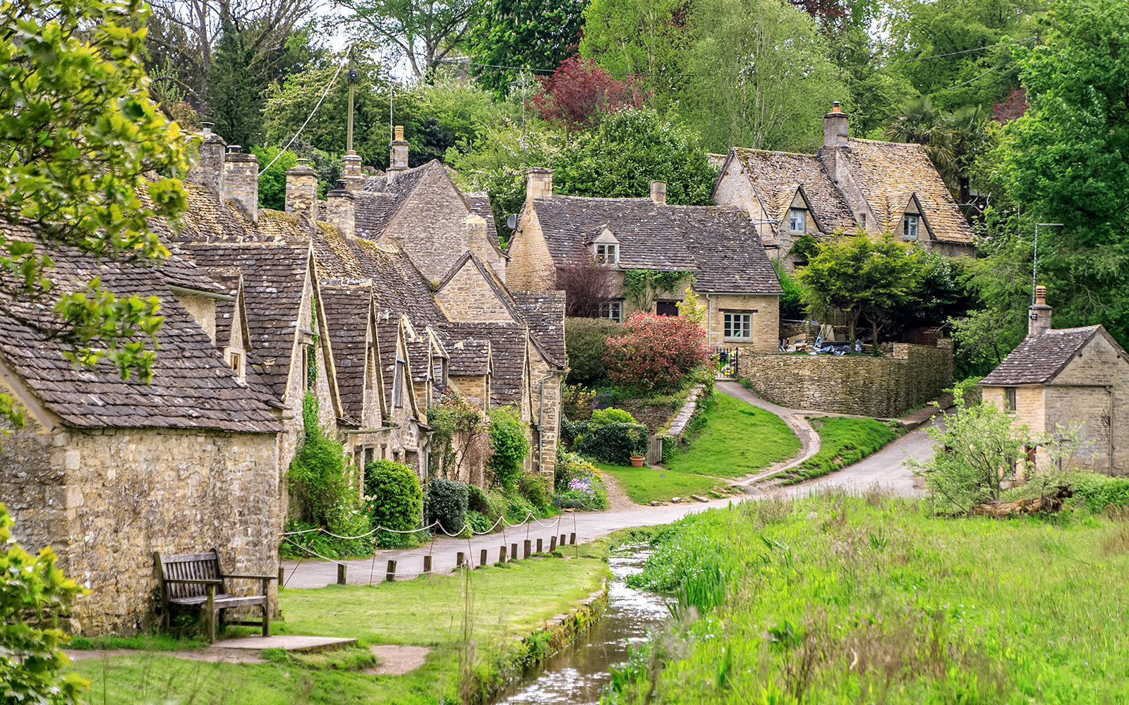 Blenheim Palace gardens with historic architecture, part of Downton Abbey Village & Cotswolds tour.