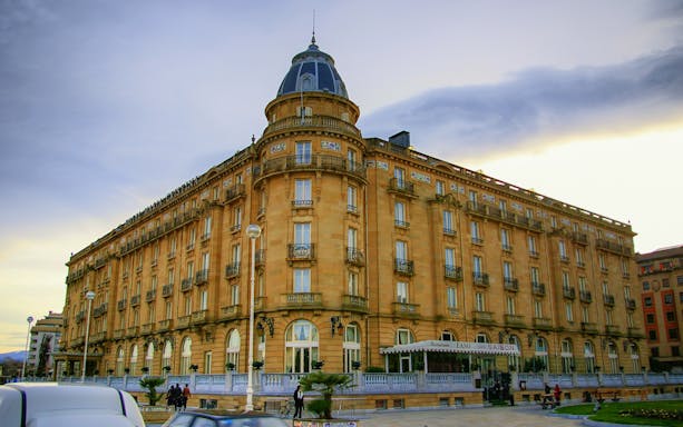 Historic building in San Sebastian on a guided walking tour with pintxo and drink.