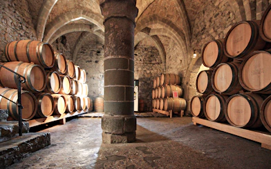 Barrels in the cellar of Chillon Castle, part of the Lake Geneva guided tour.