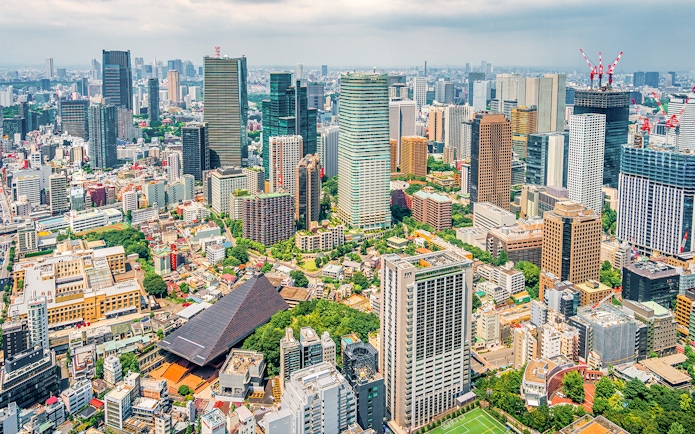 Tokyo cityscape from Tokyo Tower, showcasing skyscrapers and urban landscape.