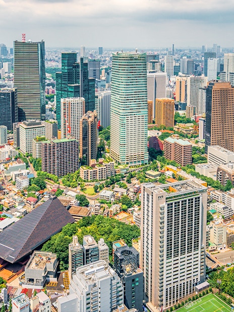 Tokyo cityscape from Tokyo Tower, showcasing skyscrapers and urban landscape.
