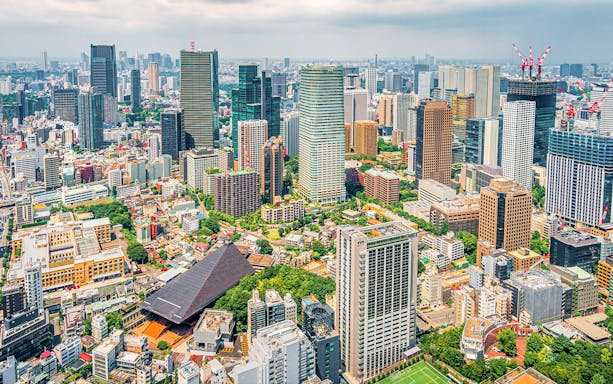 Tokyo cityscape from Tokyo Tower, showcasing skyscrapers and urban landscape.