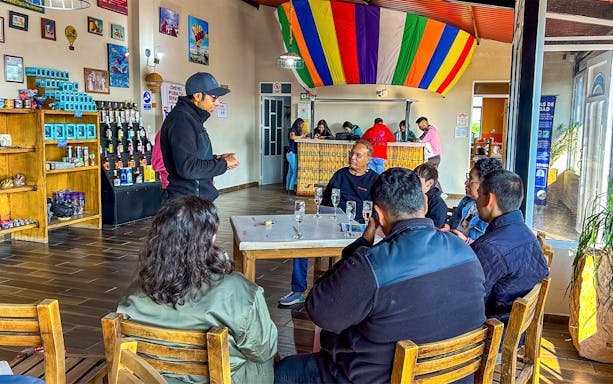 Guests enjoying a toast after a hot air balloon flight in a colorful venue.