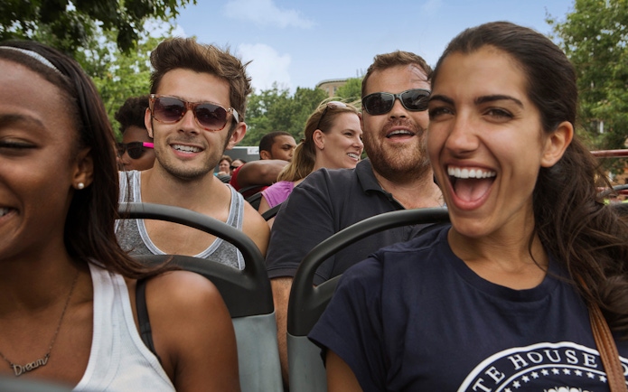 Tourists enjoying Big Bus Hop-On Hop-Off Tour in Washington DC.