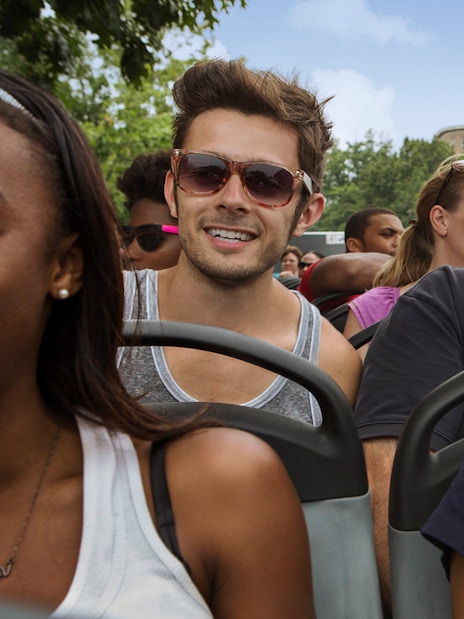Tourists enjoying Big Bus Hop-On Hop-Off Tour in Washington DC.