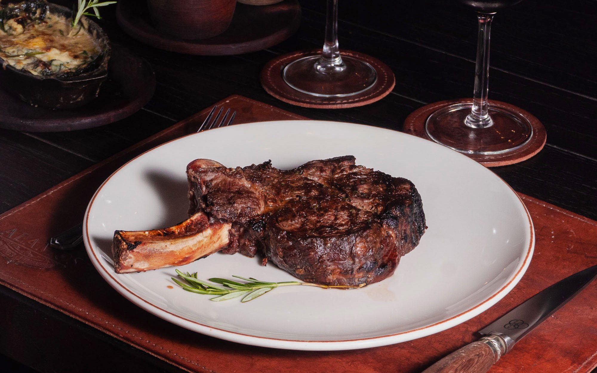 Dry-aged bone-in ribeye steak at Michelangelo Tango Show, Buenos Aires.