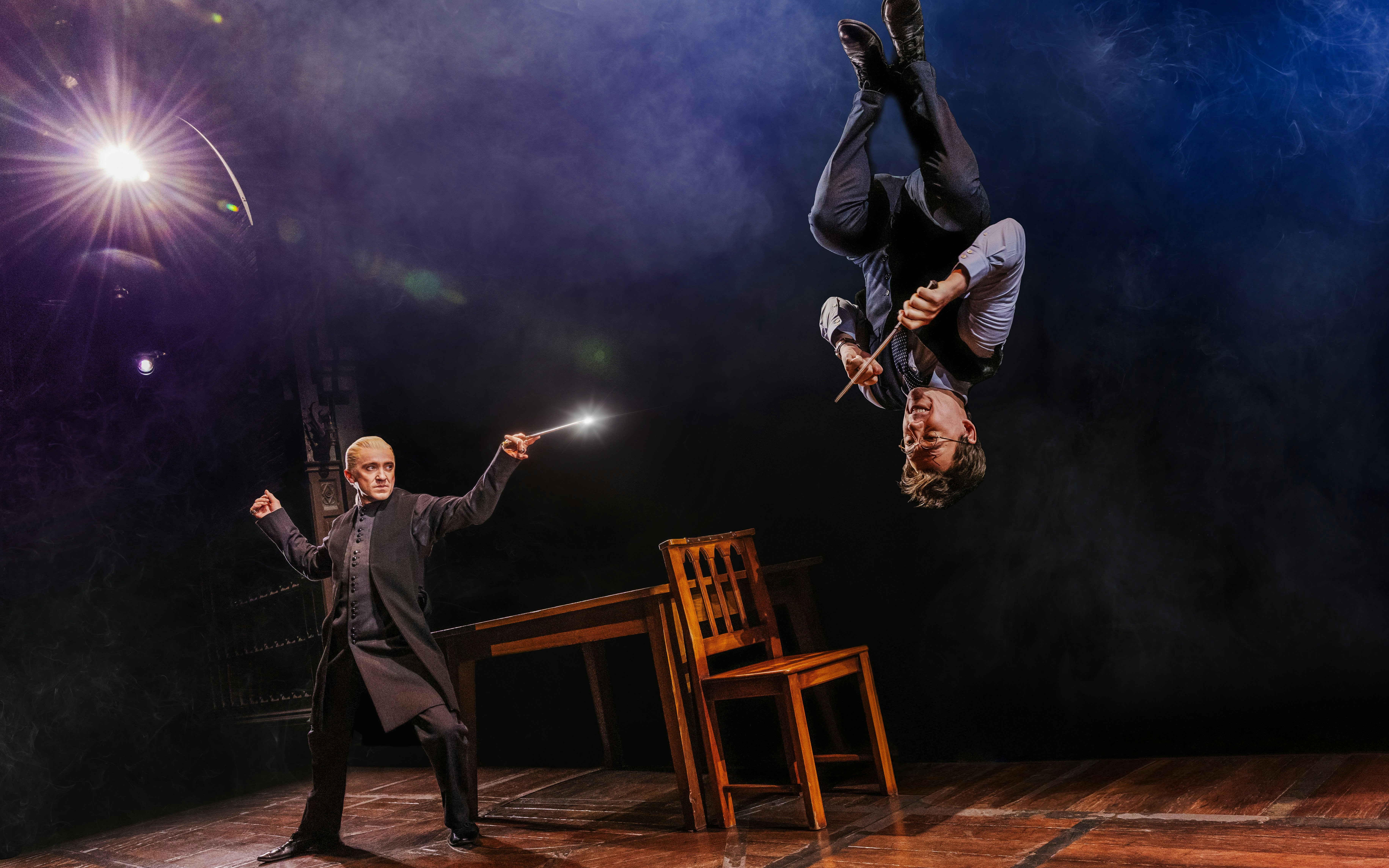 Stage scene from Harry Potter and the Cursed Child on Broadway with actors performing magic.