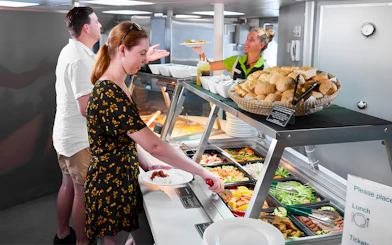 Buffet lunch on Cairns to Green Island cruise with salad and bread options.