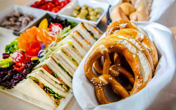 Assorted sandwiches and pretzels served at Airport Lounge Europe, Munich Airport.