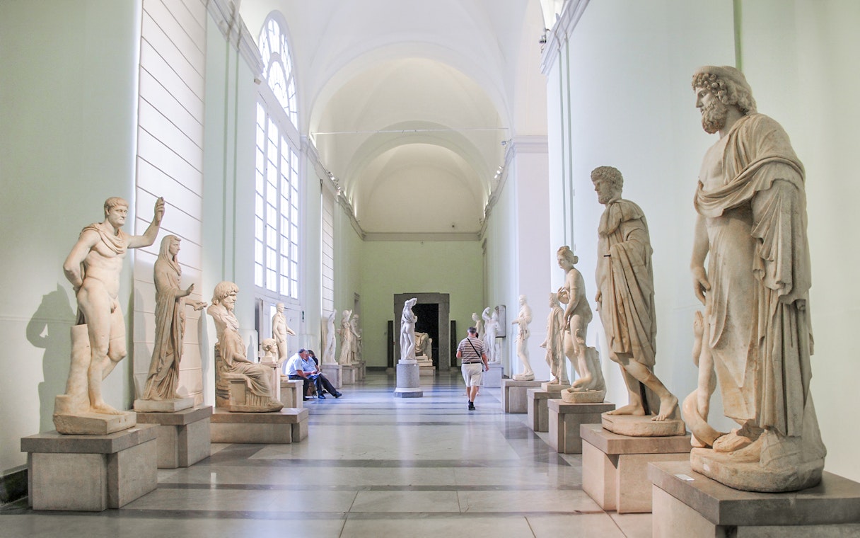 Statues in a gallery at the National Archaeological Museum, Naples.