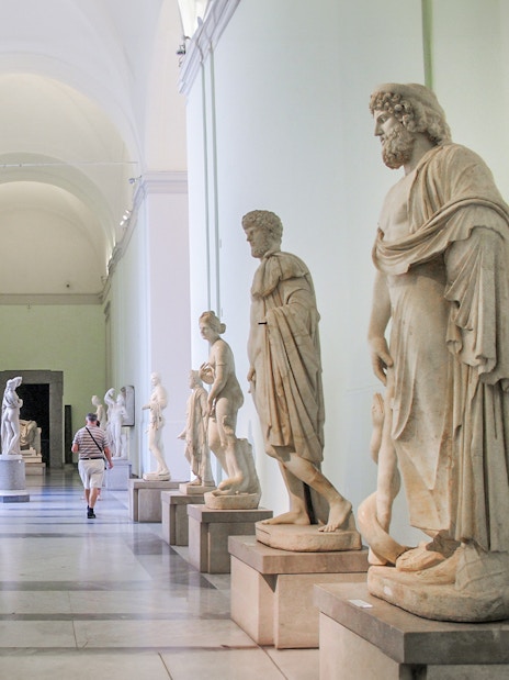 Statues in a gallery at the National Archaeological Museum, Naples.