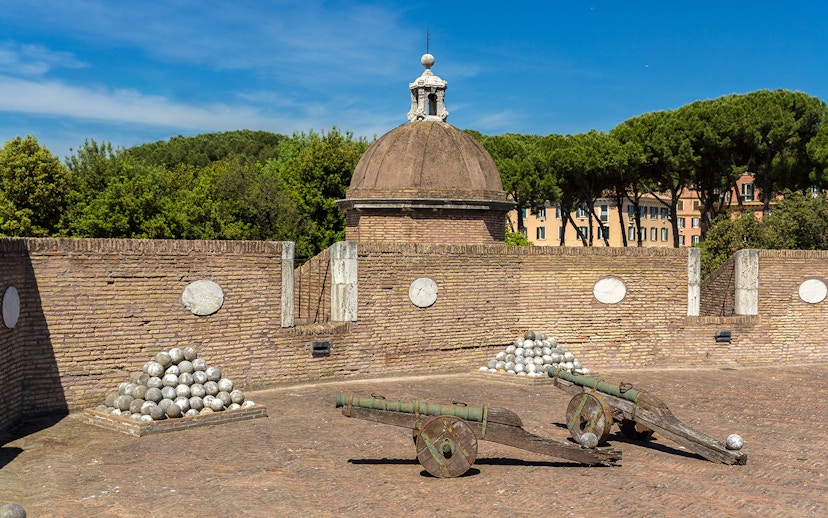 Cannons and cannonballs at Castel Sant'Angelo military exhibits in Rome.