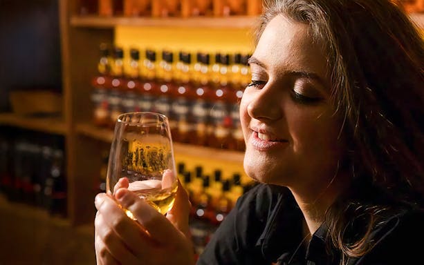 Guest enjoying a drink at the Irish Whiskey Museum.