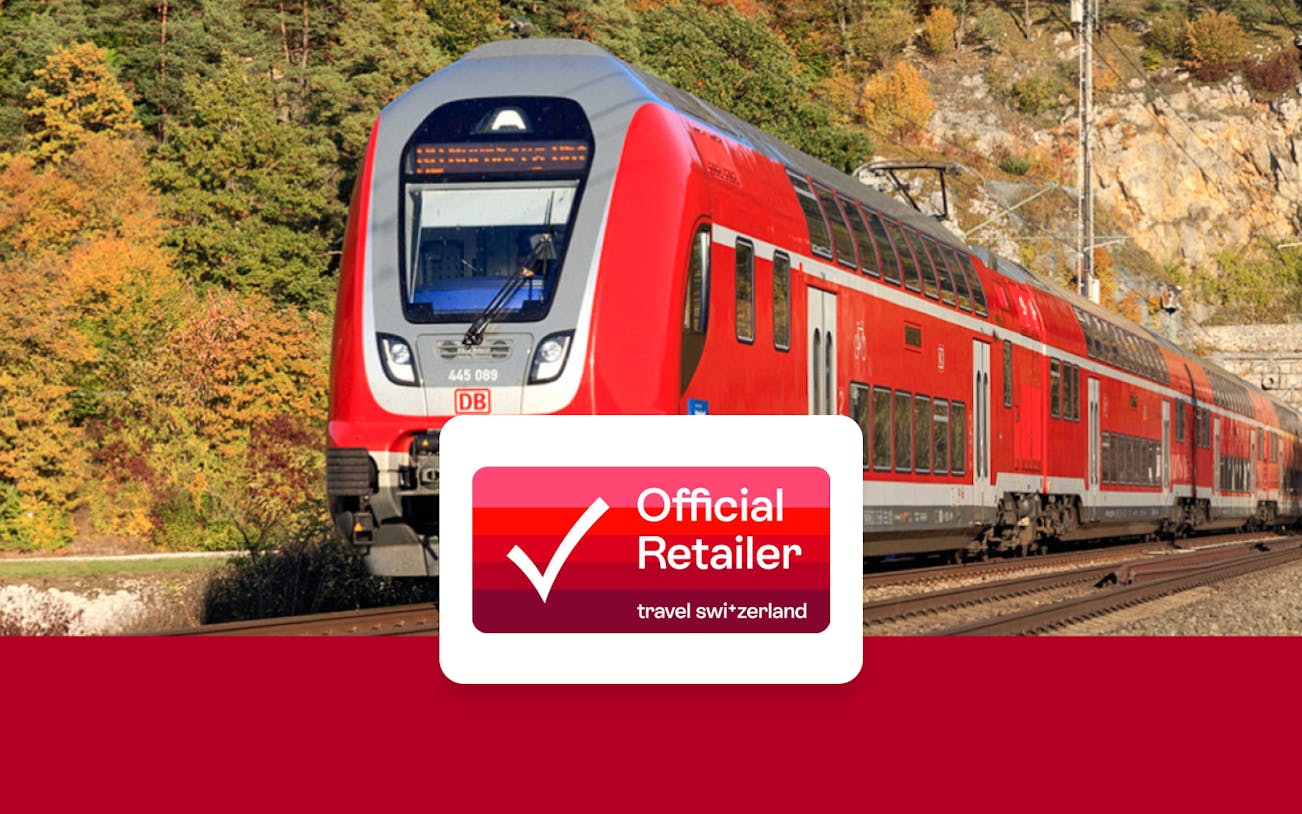 Red double-decker train on tracks in Germany