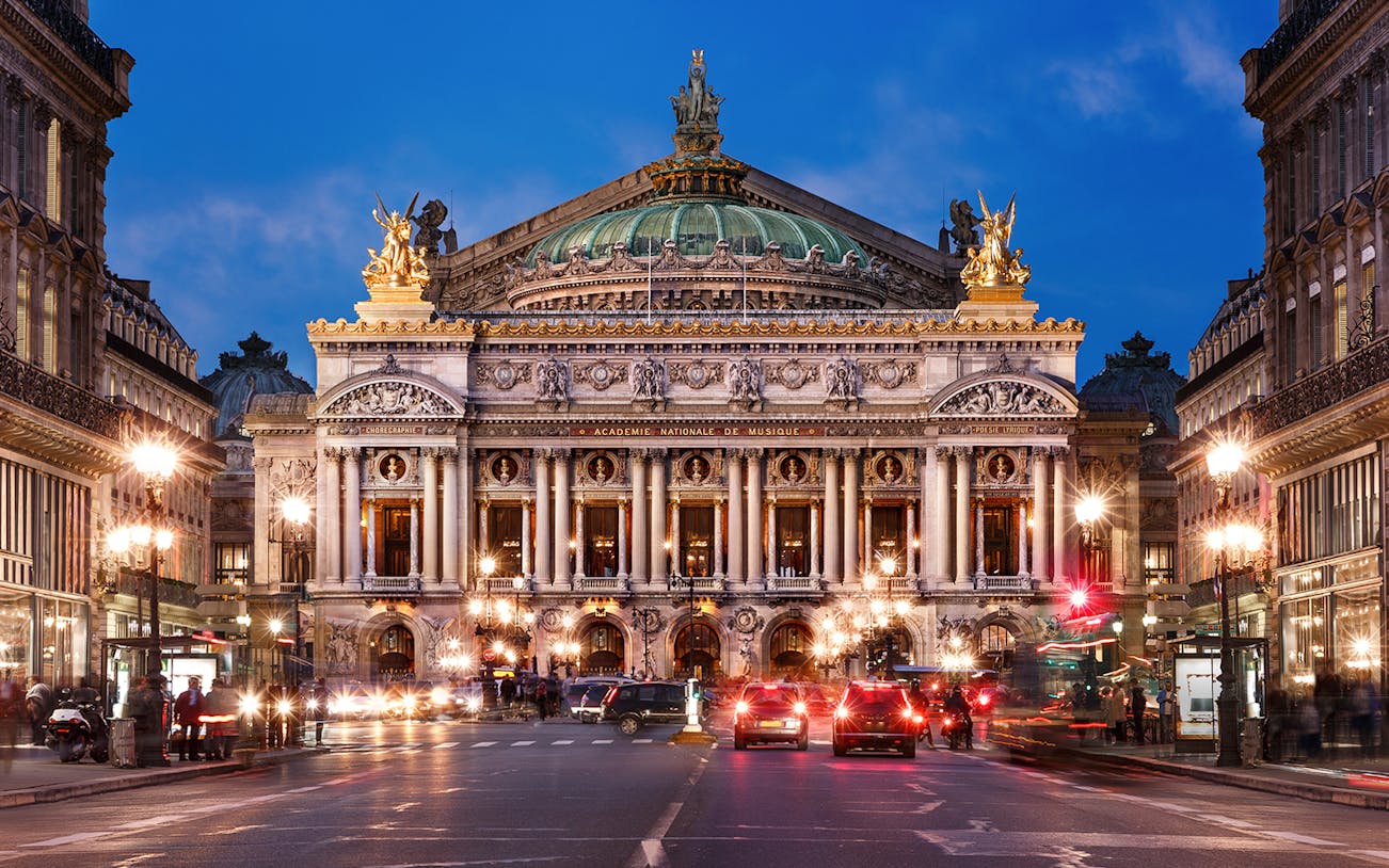 Paris Opera House illuminated at night, part of the Illuminations Tour and Moulin Rouge Show.