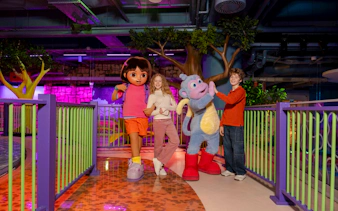 Dora and Boots meet and greet with children at Nickelodeon Play Tersane Istanbul rainforest area.