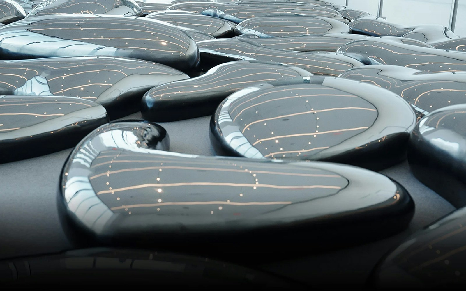 Visitors enjoying panoramic views from SUMMIT One Vanderbilt's Reflect installation in New York City.