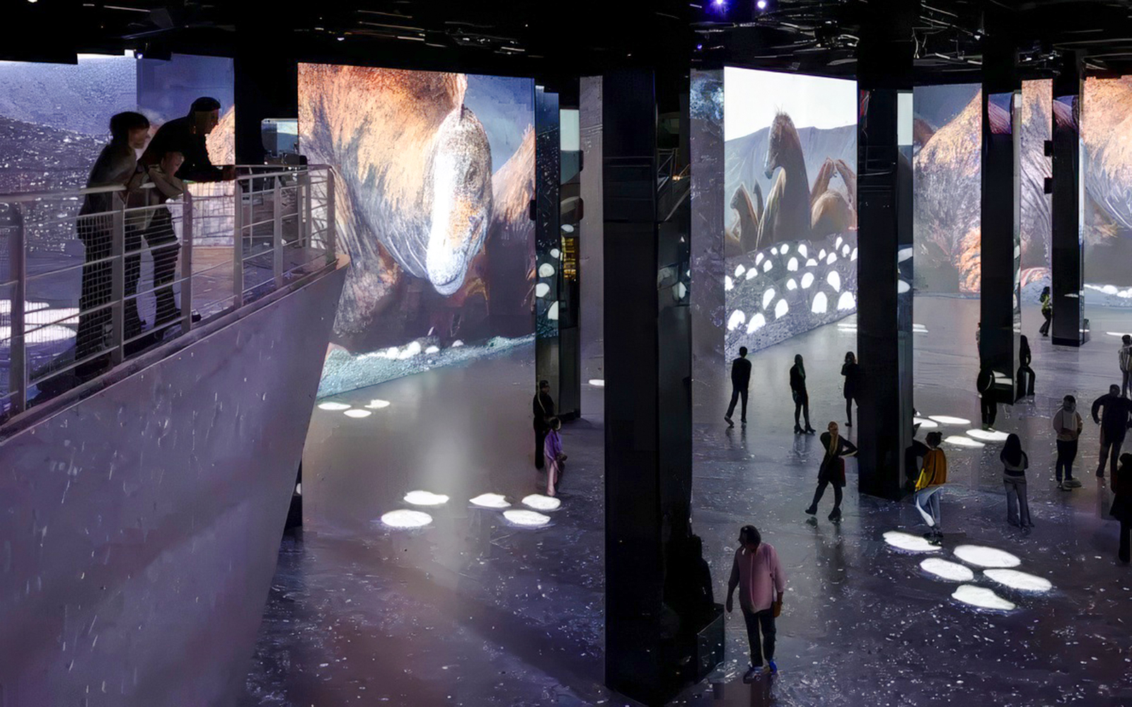 Guests exploring digital dinosaur displays at Phoenix des Lumières Dortmund exhibition.
