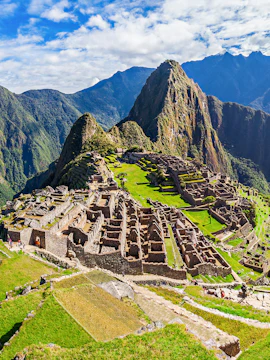 Machu Picchu ruins with Huayna Picchu mountain in the background, Peru.