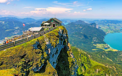 Mountain hut on Schafberg peak overlooking Salzkammergut lakes, Hallstatt, Austria.