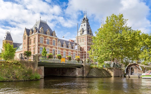 Rijksmuseum viewed from the canal in Amsterdam.