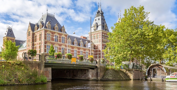 Rijksmuseum viewed from the canal in Amsterdam.
