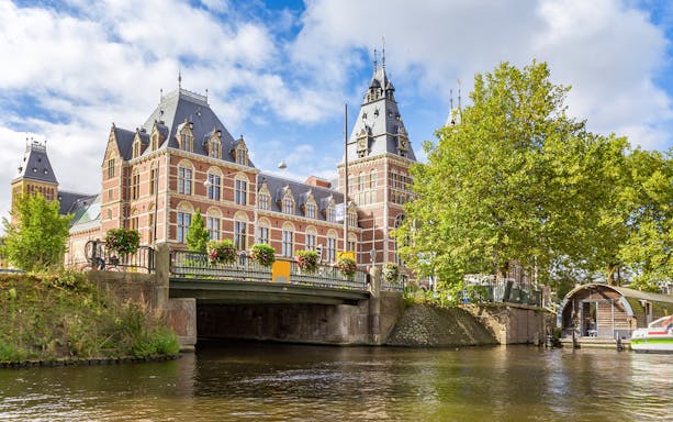 Rijksmuseum viewed from the canal in Amsterdam.