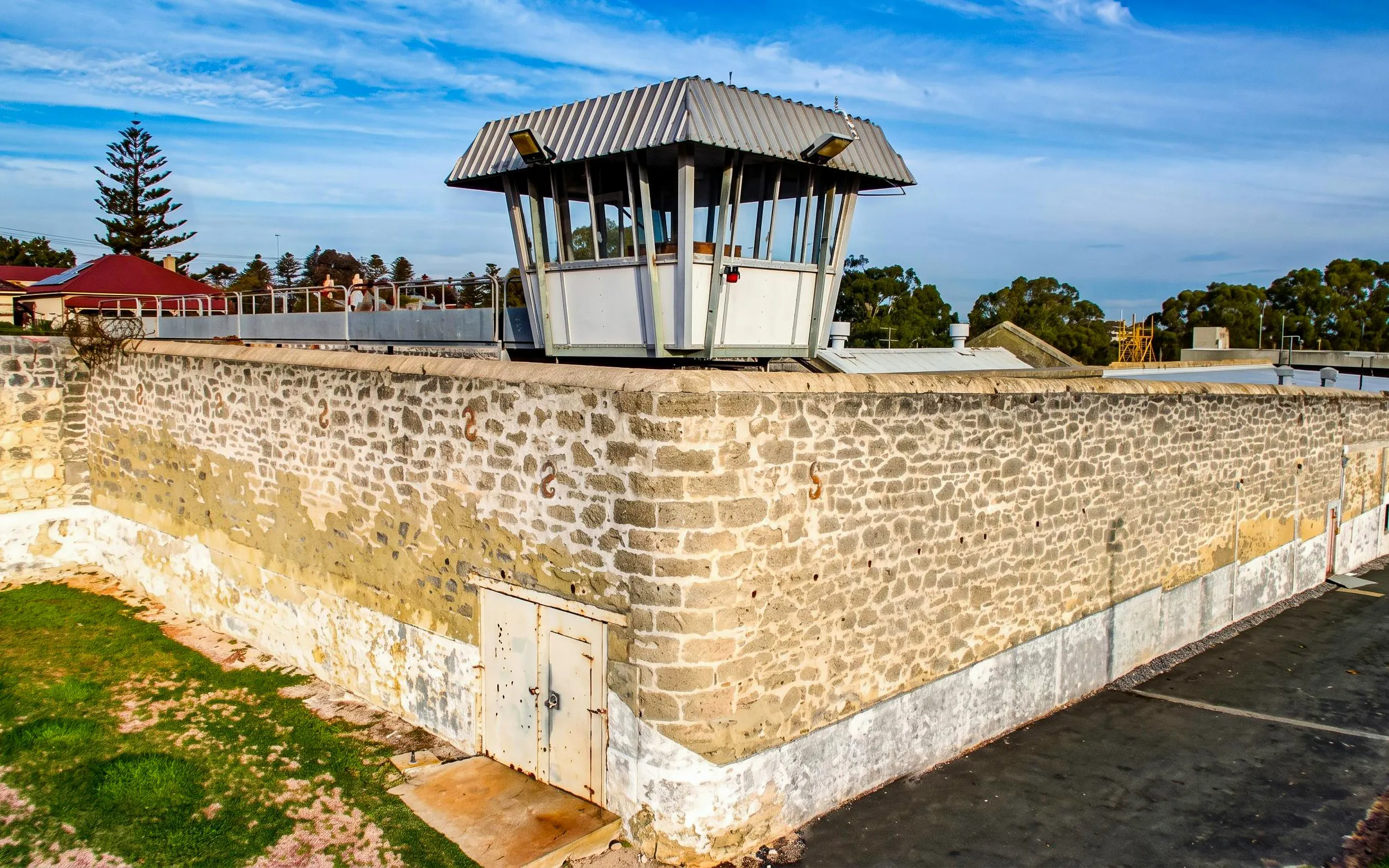 Watch tower at Fremantle Prison, historic stone walls, and surrounding landscape.