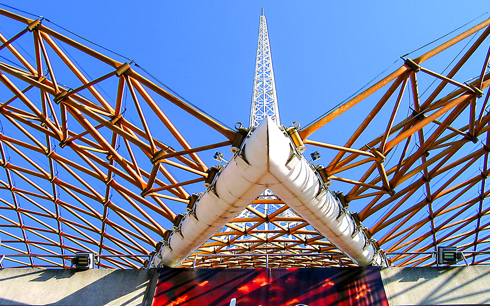 Arts Centre Melbourne spire and lattice structure against blue sky.