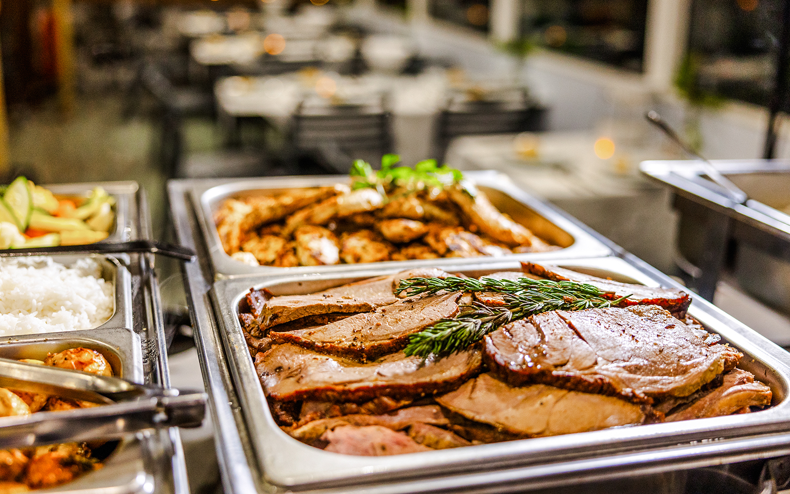 Buffet dinner with roast meats and rice on Gold Coast sightseeing cruise.