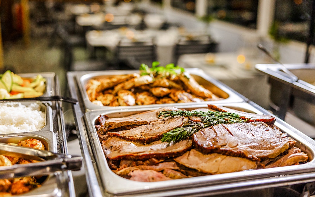 Buffet dinner with roast meats and rice on Gold Coast sightseeing cruise.