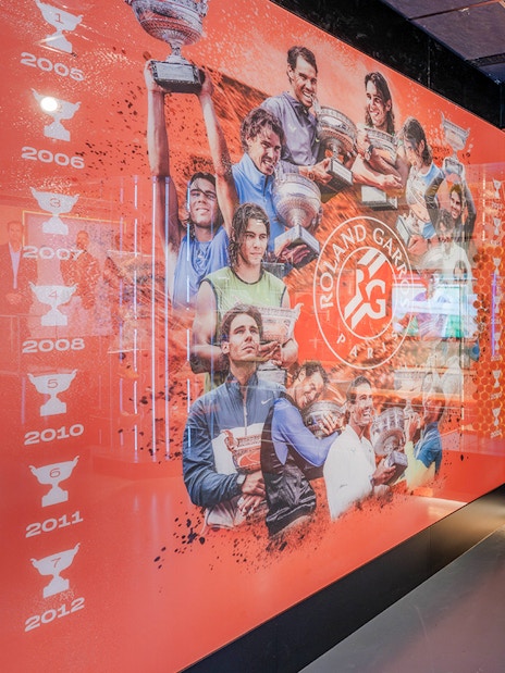 Rafa Nadal Museum Xperience interior with tennis memorabilia and championship displays.