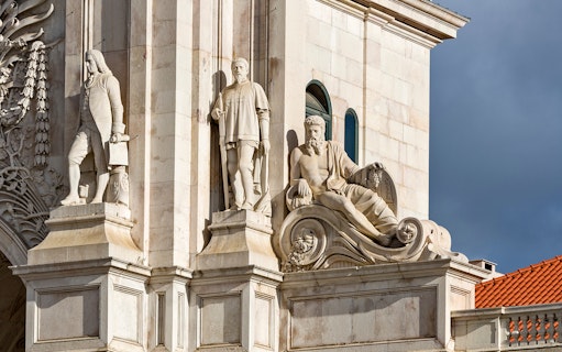 Statues on Rua Augusta Arch in Lisbon, Portugal.