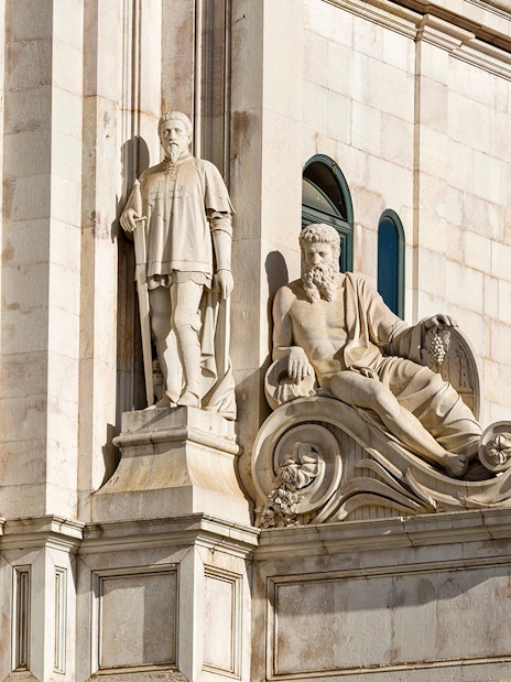 Statues on Rua Augusta Arch in Lisbon, Portugal.