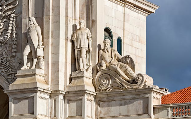 Statues on Rua Augusta Arch in Lisbon, Portugal.