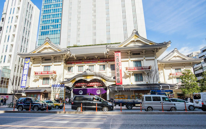 Kabuki Za Theater in Tokyo with traditional architecture and city backdrop.