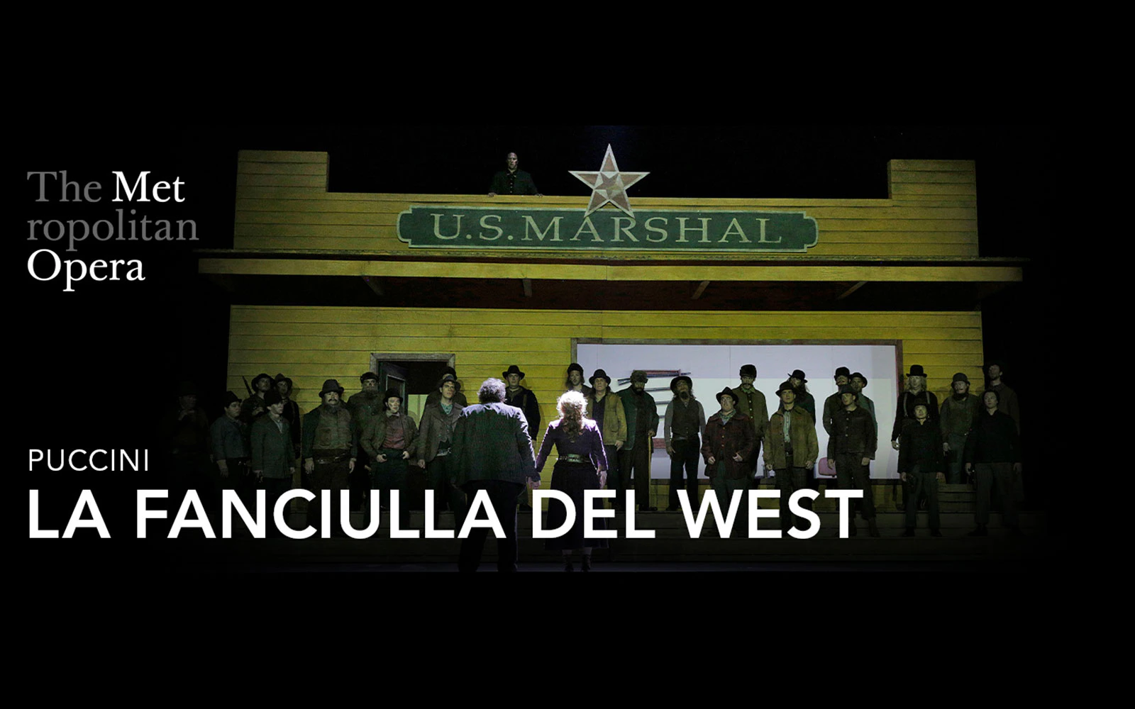 La Fanciulla del West performance at the Metropolitan Opera, Broadway stage with cast.