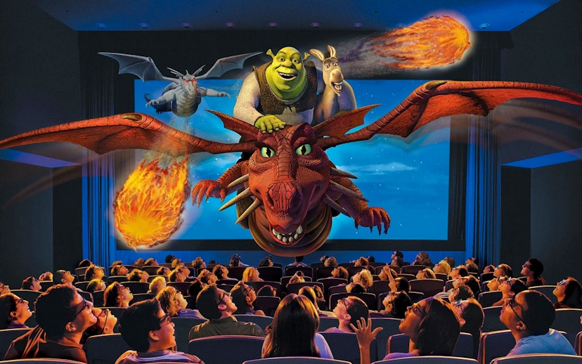 Guests experiencing 4-D effects with Shrek and friends in motion seats.