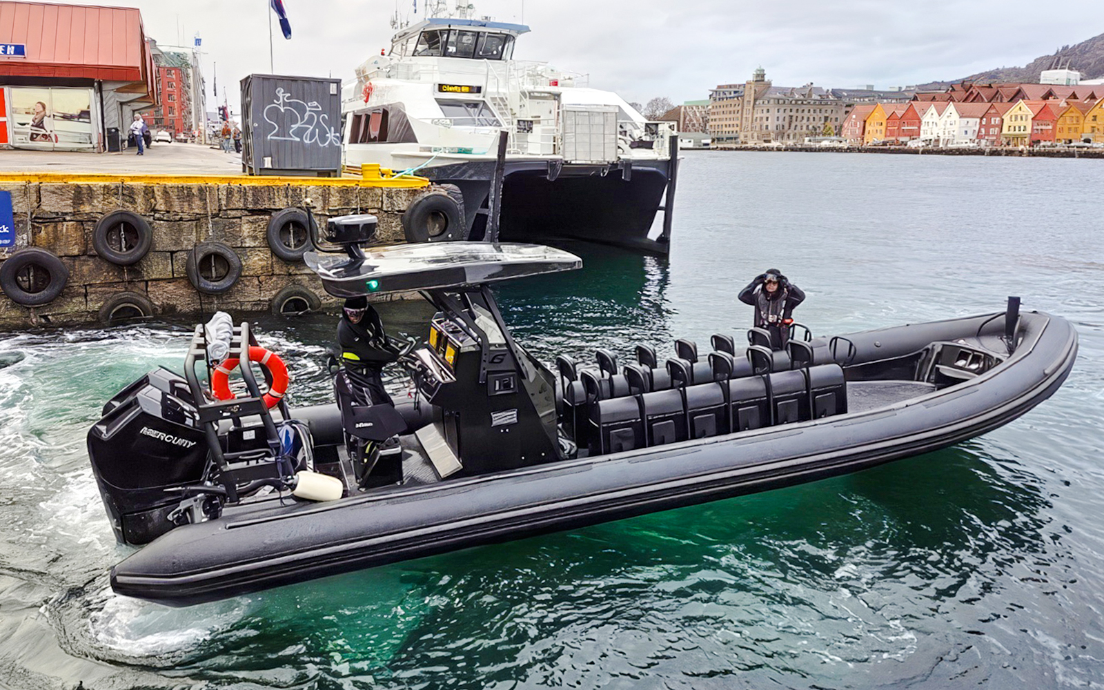 RIB boat at boarding point for Alversund Fjord Safari in Norway.