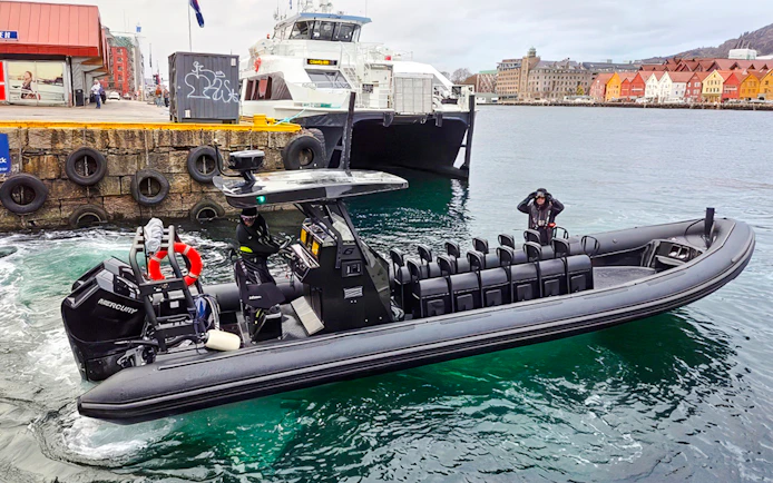 RIB boat at boarding point for Alversund Fjord Safari in Norway.