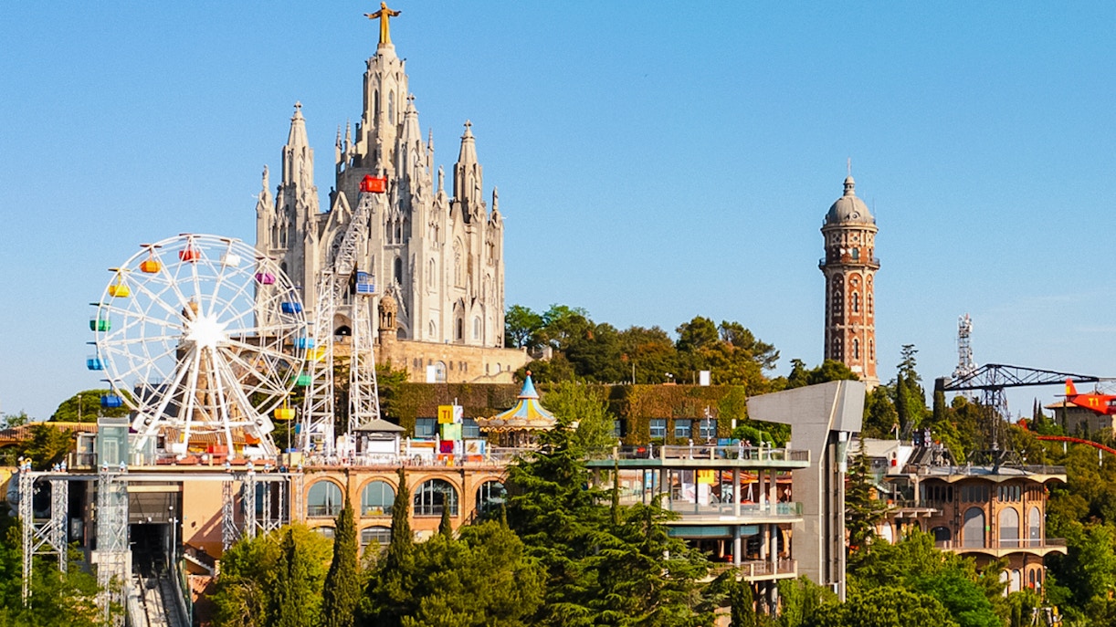 Tibidabo Amusement Park with Ferris wheel and church, overlooking Barcelona.