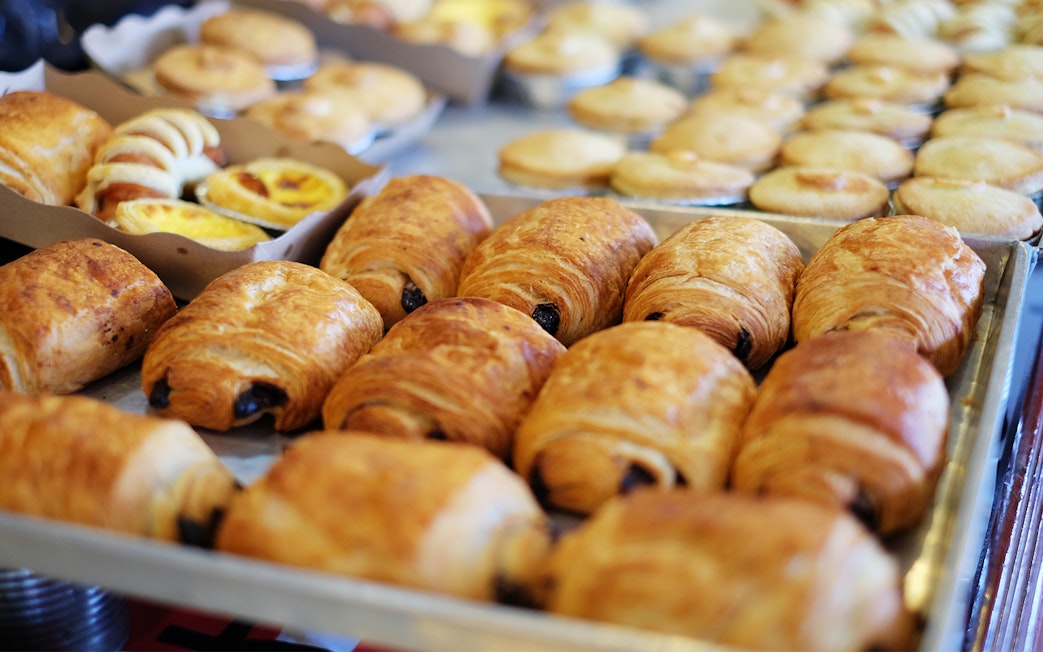 Pastries on display at a Parisian bakery, part of the Emily in Paris filming tour.