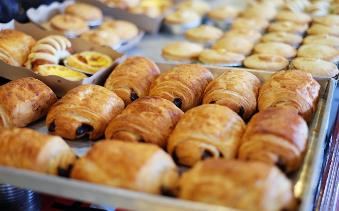 Pastries on display at a Parisian bakery, part of the Emily in Paris filming tour.