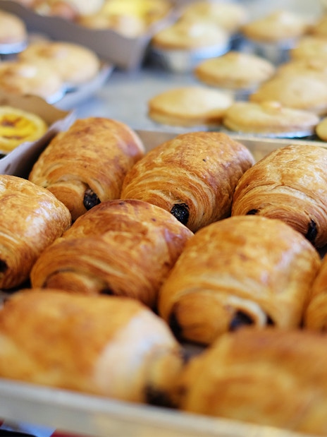 Pastries on display at a Parisian bakery, part of the Emily in Paris filming tour.