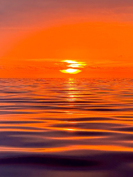Sunset over ocean during Private Dolphin & Whale Watching Cruise, Gran Canaria.