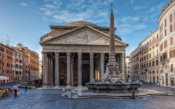 Pantheon in Rome with fountain and obelisk in foreground, showcasing ancient architecture.