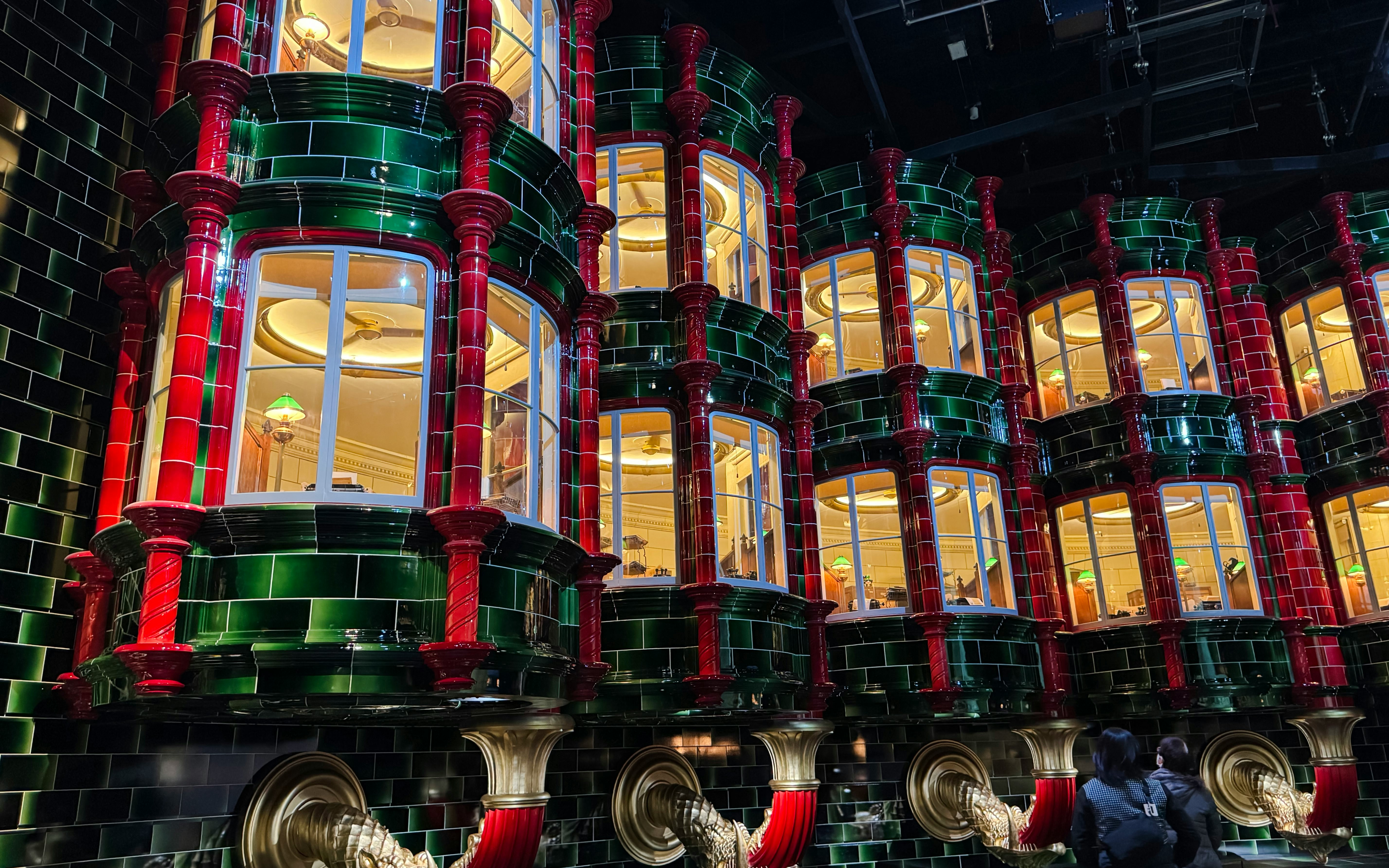 Ministry of Magic atrium with green and red tiled walls, London Harry Potter tour.