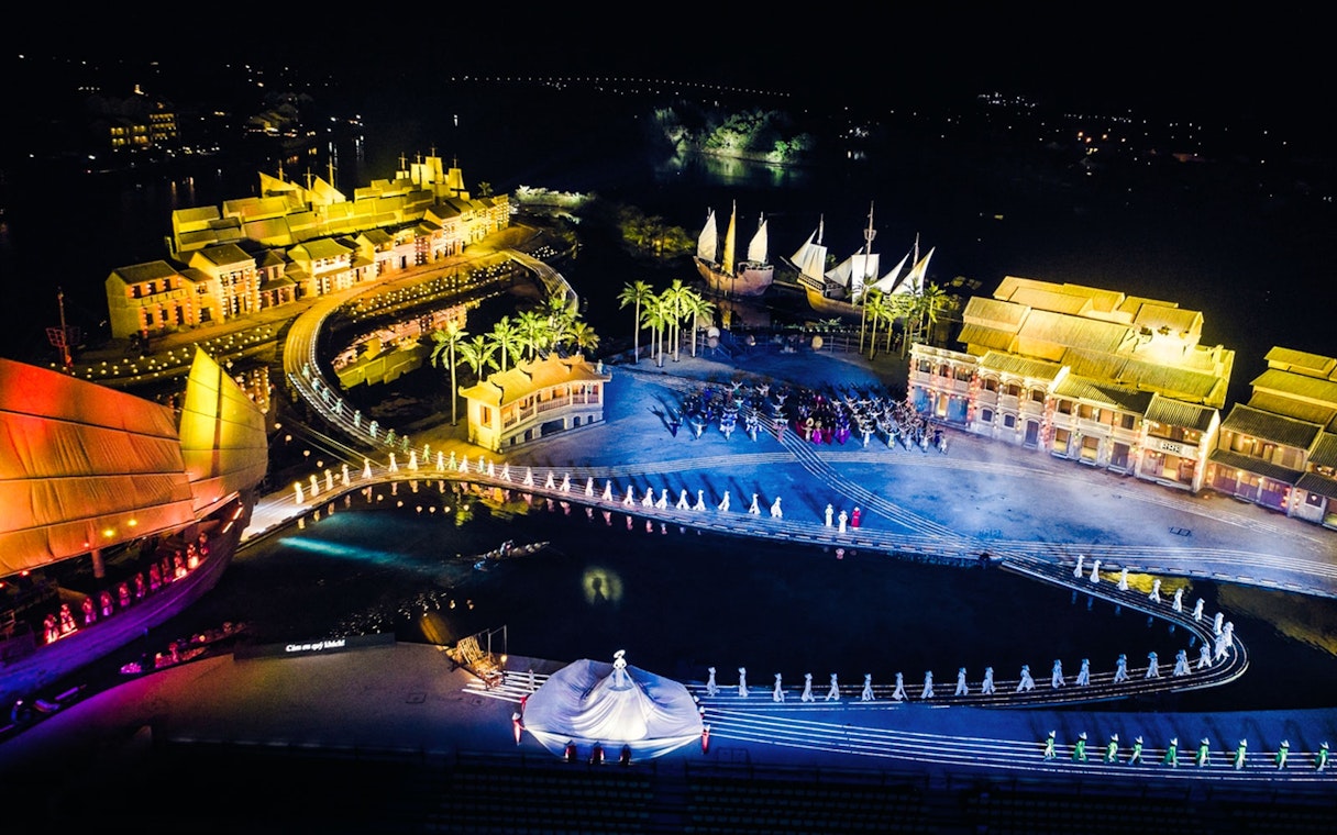 Aerial view of Hoi An Memories Show with illuminated stage and performers, Vietnam.