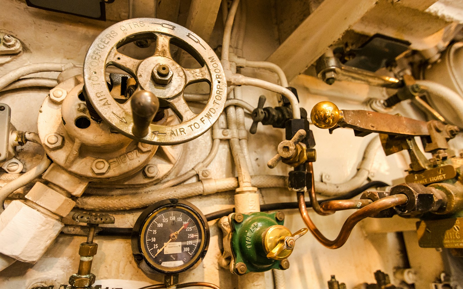 Control panel with gauges and valves inside USS Bowfin Submarine.
