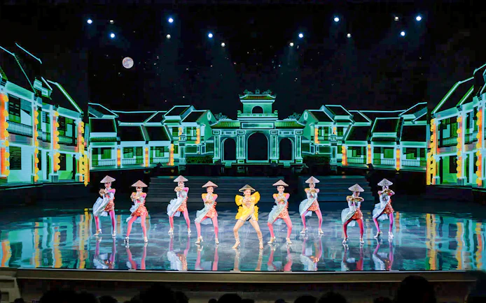 Performers in traditional costumes on stage at Colosseum Cabaret Show, Pattaya.